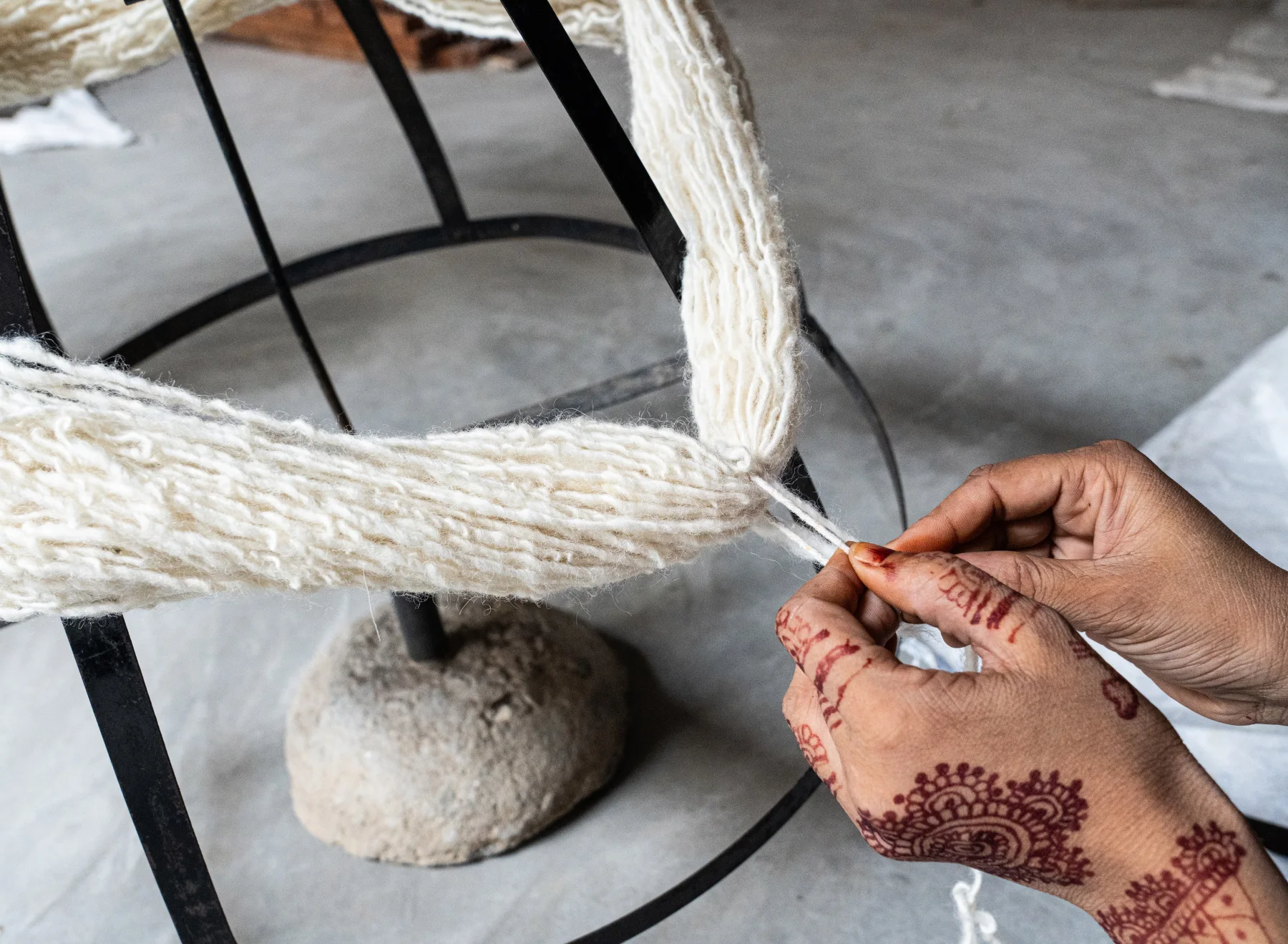Close detail of hand-weaving on the loom